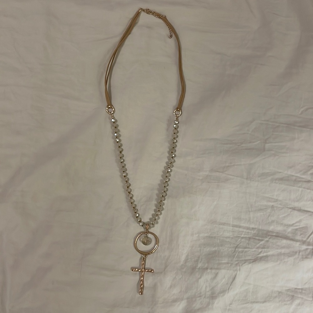 Leather and bead cross necklace.